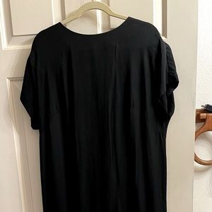Elegant simple black dress perfect for a night on the town or formal event.